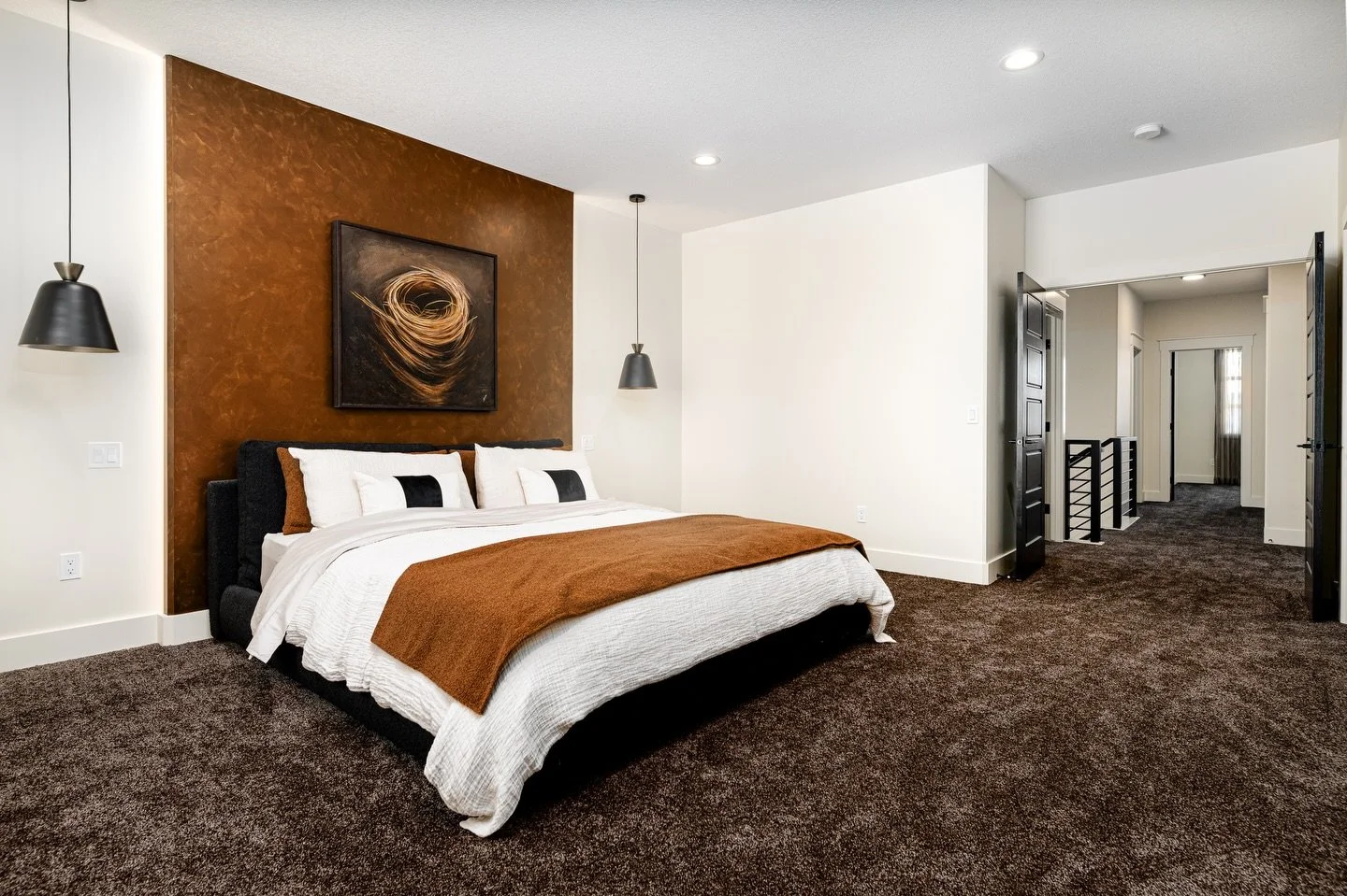 Warm oak tones and timeless comfort for the ultimate retreat.