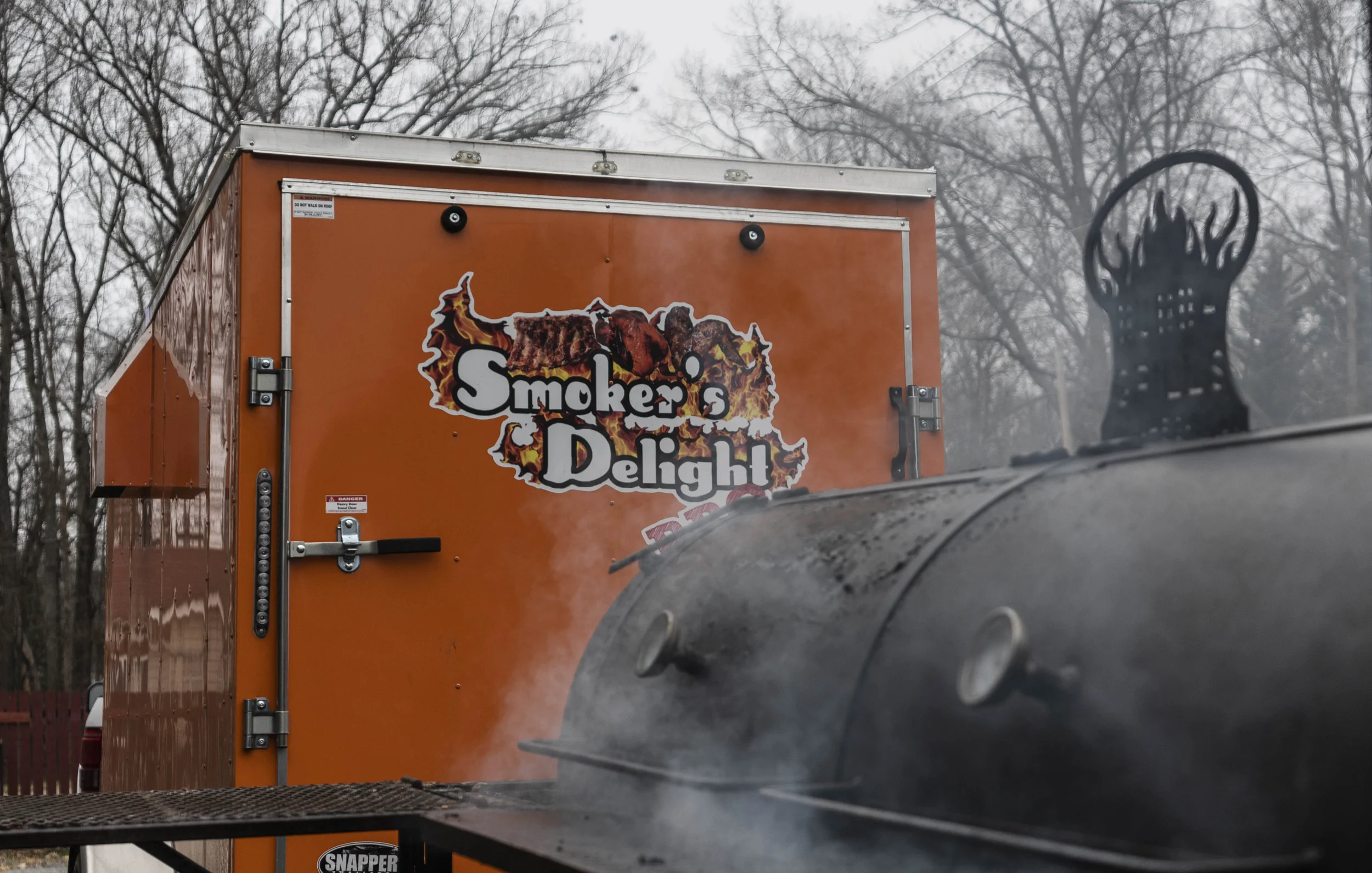 About — Smoker's Delight BBQ