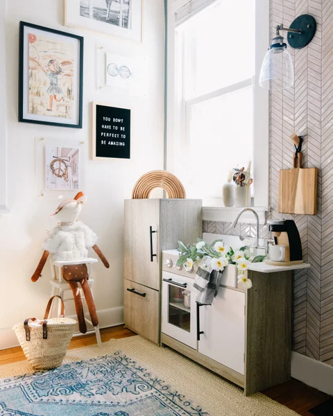 Max’s Playroom: Soho Kitchen Set, Wayfair , Market Basket, Wayfair , Corynne Carpet, Lulu and Georgia , High Chair, Pottery Barn mStarr Design // Photo: Jessica Delaney