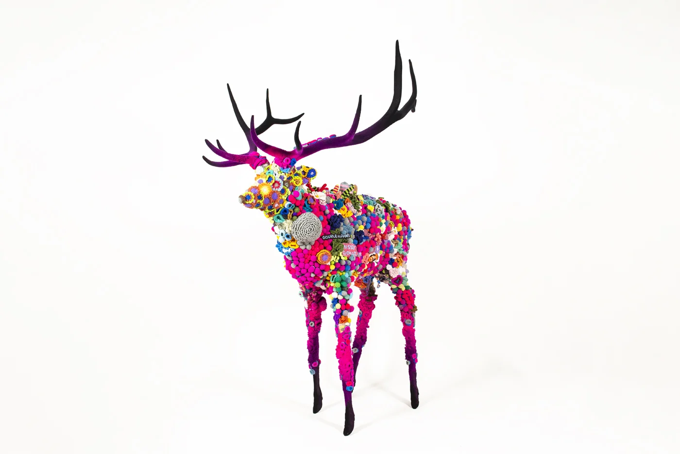 Plastic, spray paint, fiberglass, epoxy, crochet, flock, double happiness.