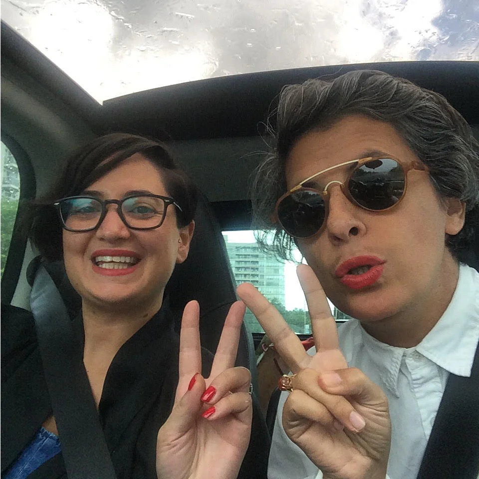 Heidi and Samira listen while driving in Toronto.