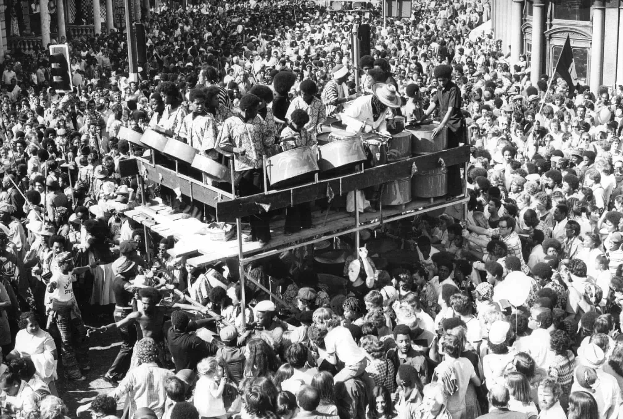 1977 . A vast crowd follow a steel band Photograph: ANL/Rex/Shutterstock