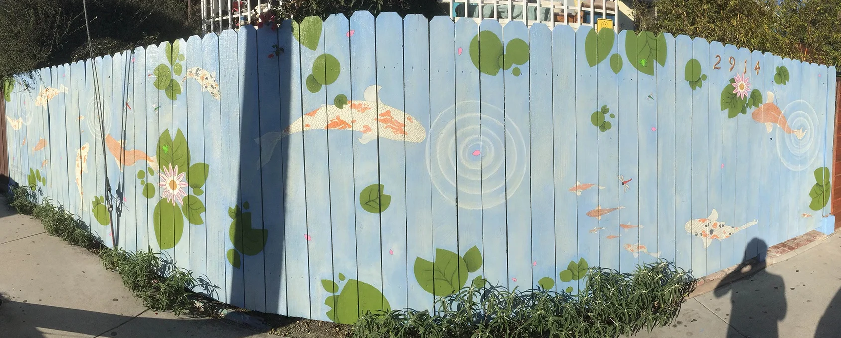 Hand painted Koi Pond Mural on wooden fencing - 7.5ft high x 40ft long