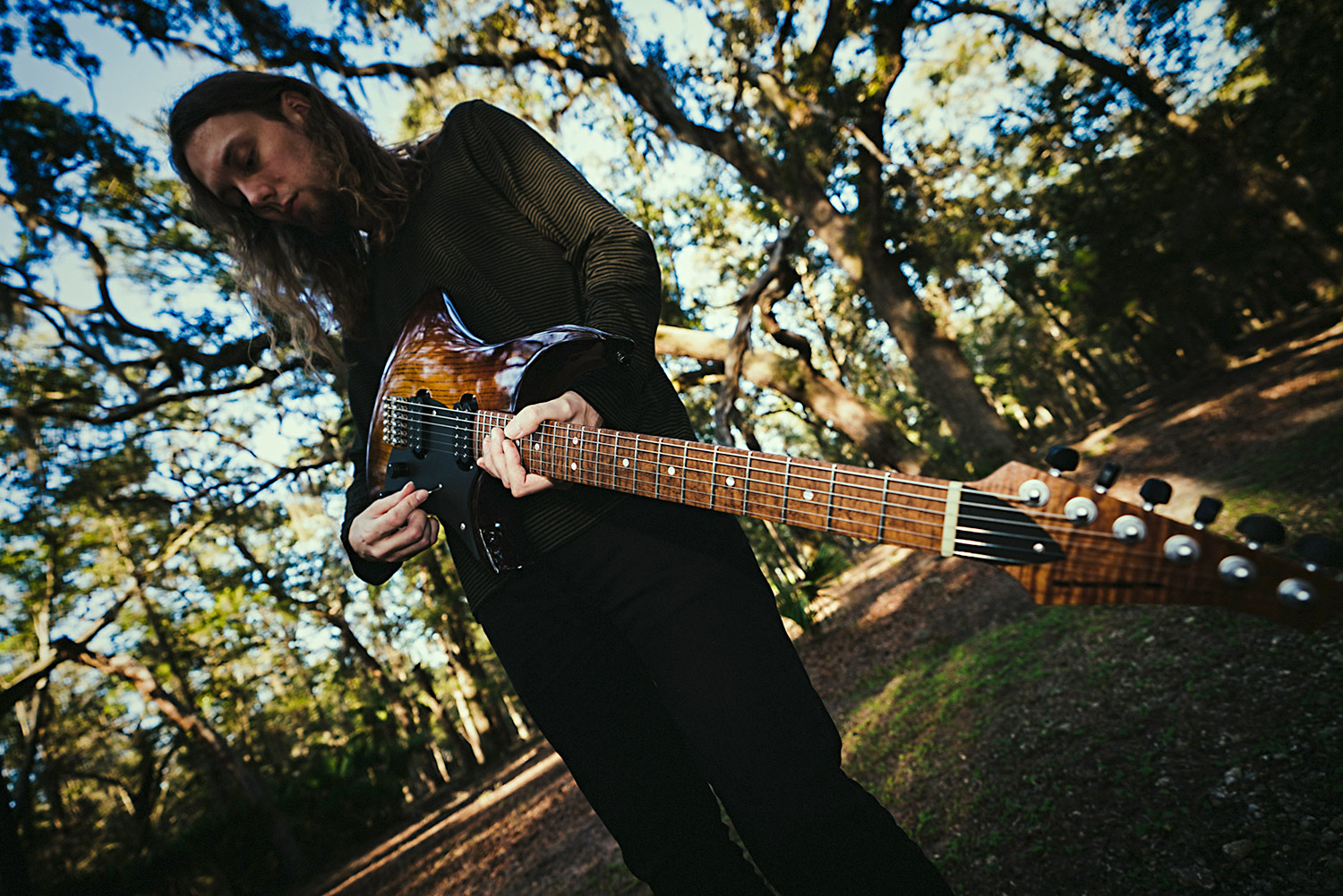 PHOTO: Mike Dawes with his Goshawk™ 6-string electric guitar. (Photo: Adam King)