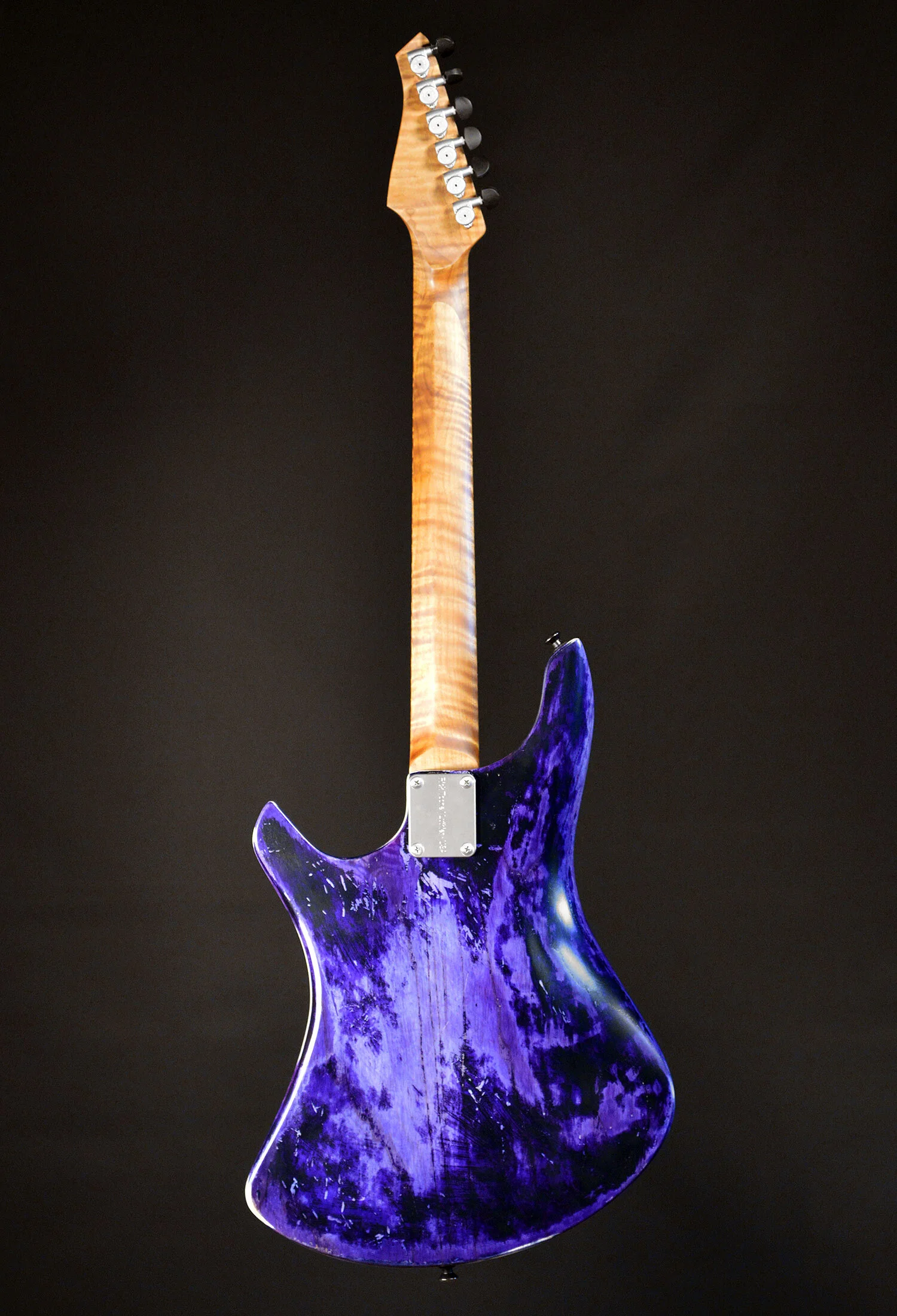 PHOTO: Compact curves that fit. Swamp ash solid body.