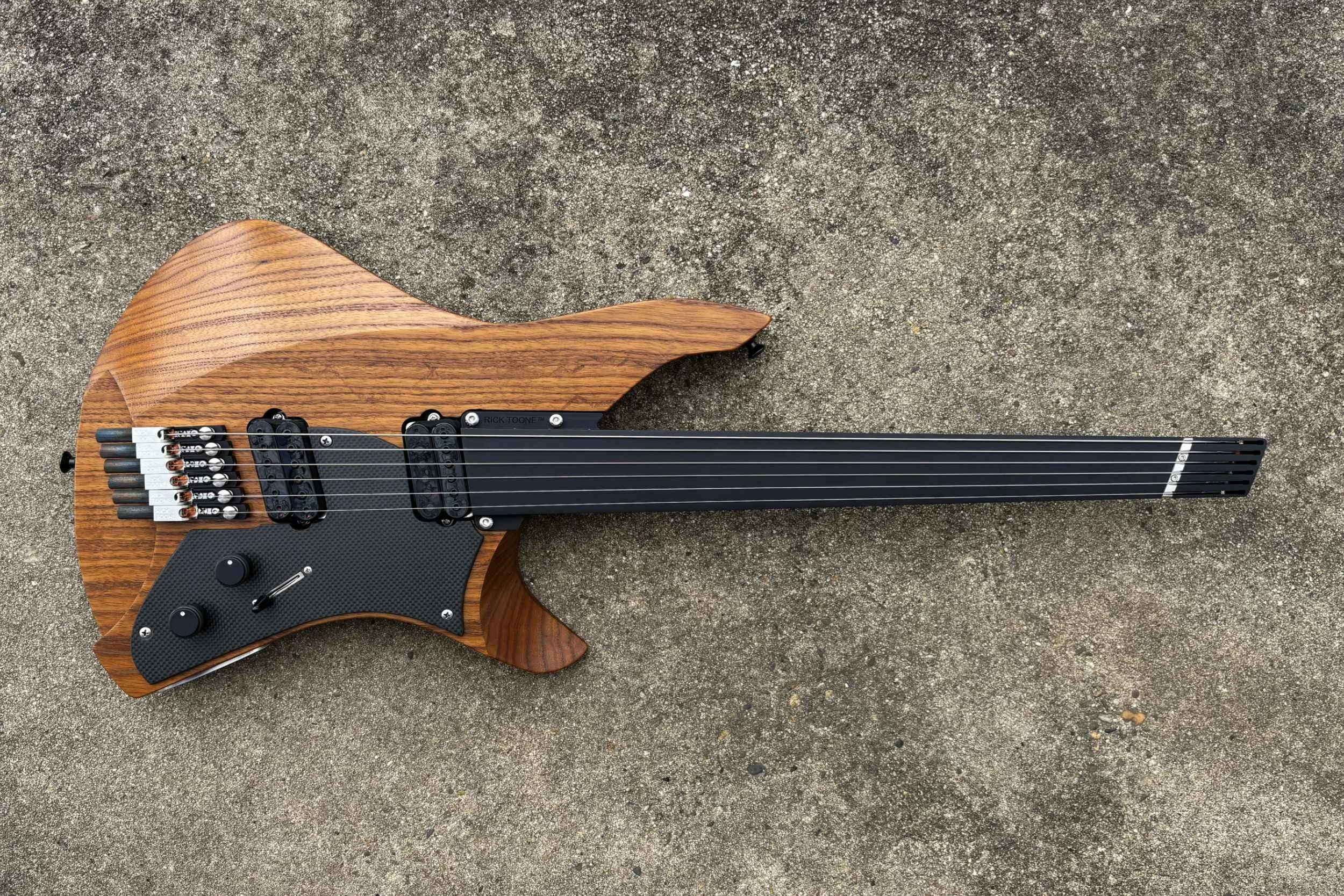 Rick Toone Wingspan 6 Fretless Guitar.jpg