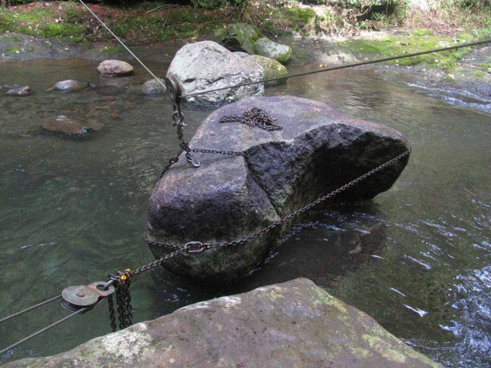 Winching a boulder into place