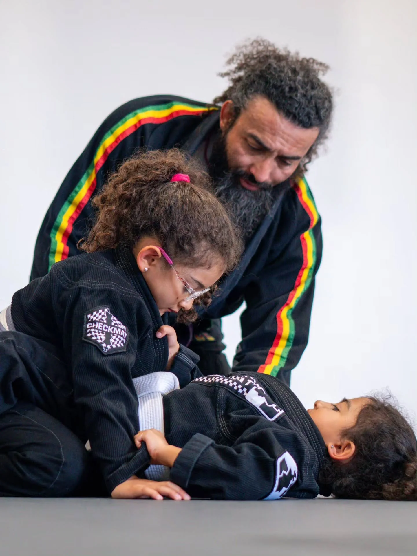 Some lessons happen during class.

Some happen on the edge of the mats.

The strongest communities are built when parents lead by example and children have the opportunity to learn, grow, and thrive alongside them.

This is the culture we're proud to