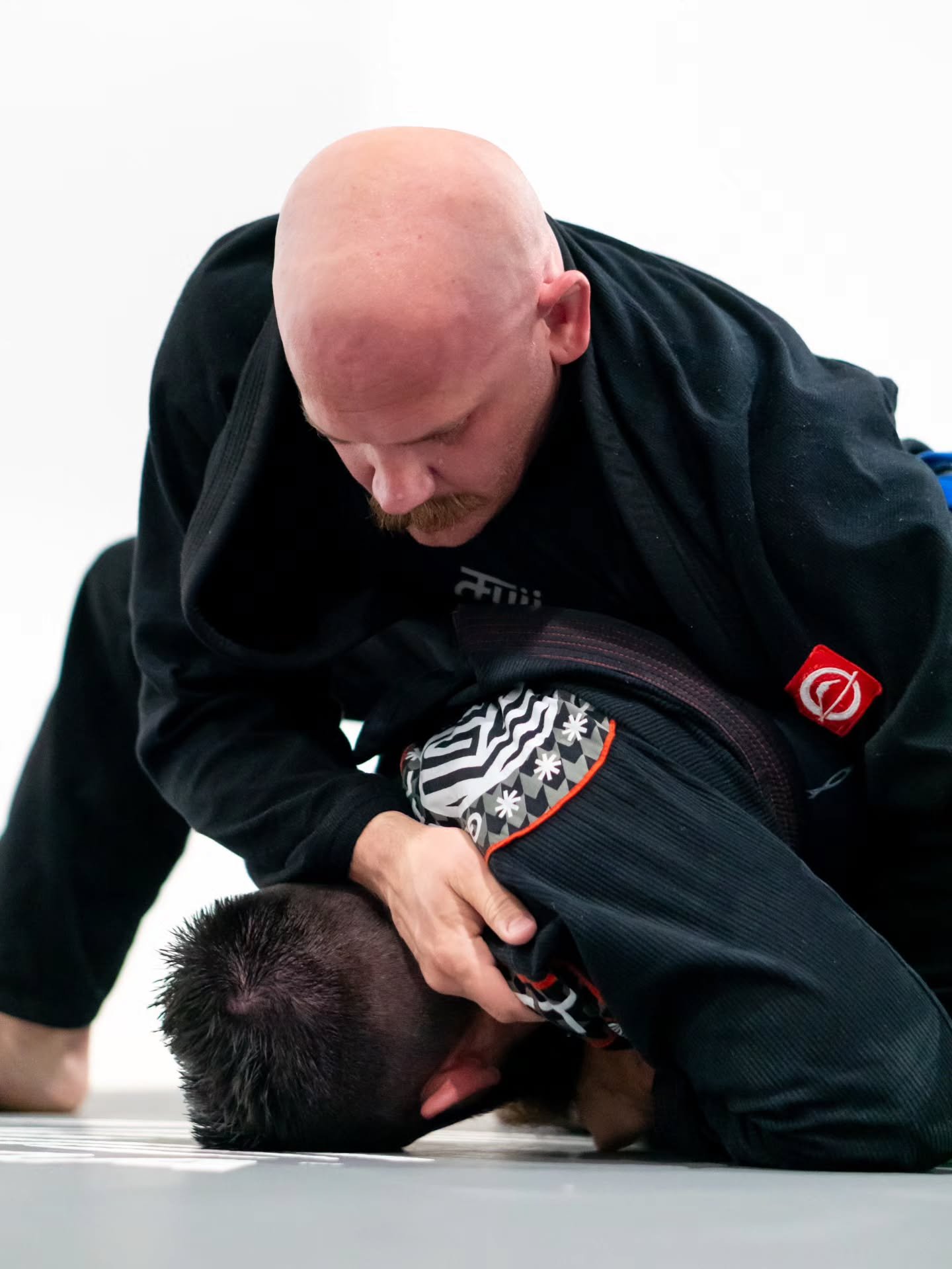 The details matter.

Every grip.
Every adjustment.
Every repetition.

There are no shortcuts in Jiu-Jitsu. Progress is built one round, one class, and one lesson at a time.

That's what we believe.
That's what we teach.

Family &bull; Culture &bull; 