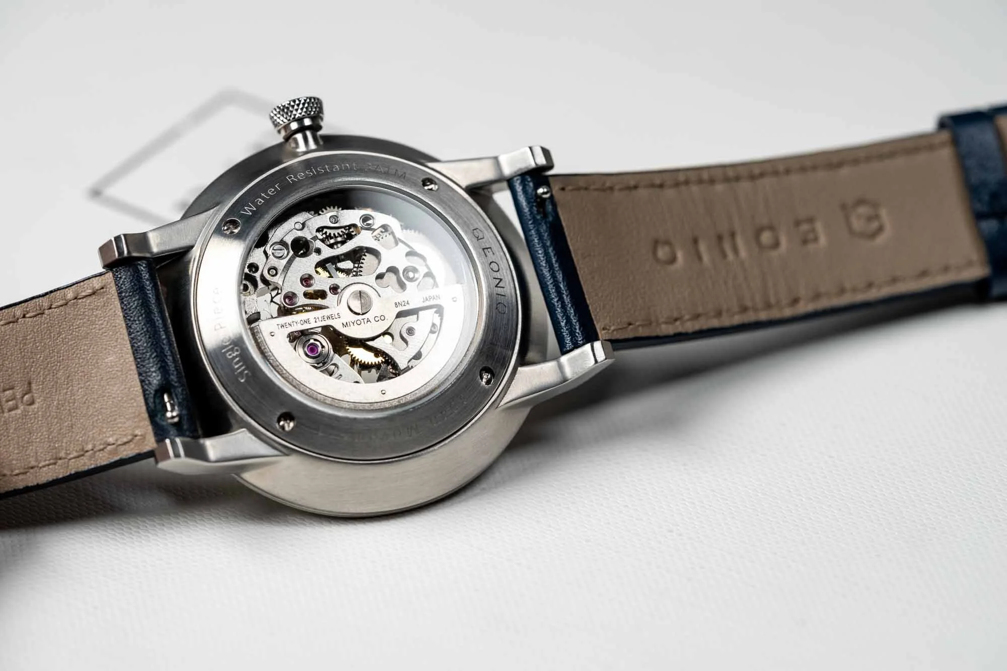 engraved skeleton watch