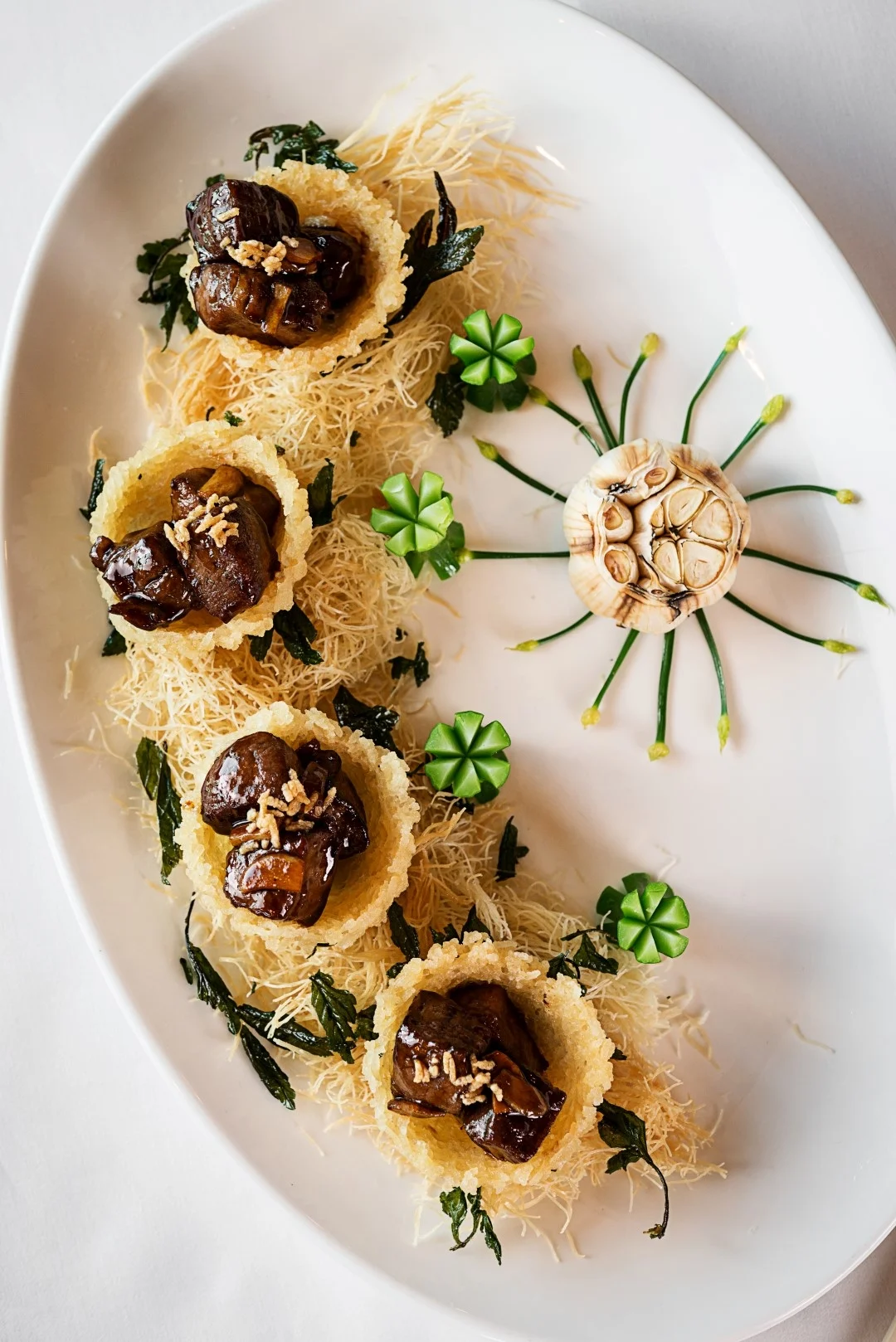 Award-winning garlic premium Wagyu beef cube in a cracker nest