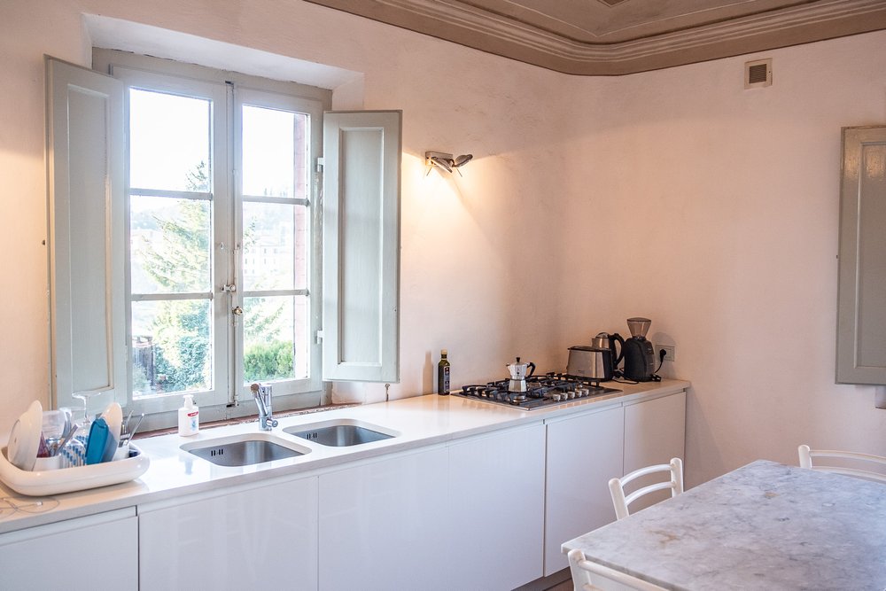  Our modern kitchen with views of the olive grove below.  