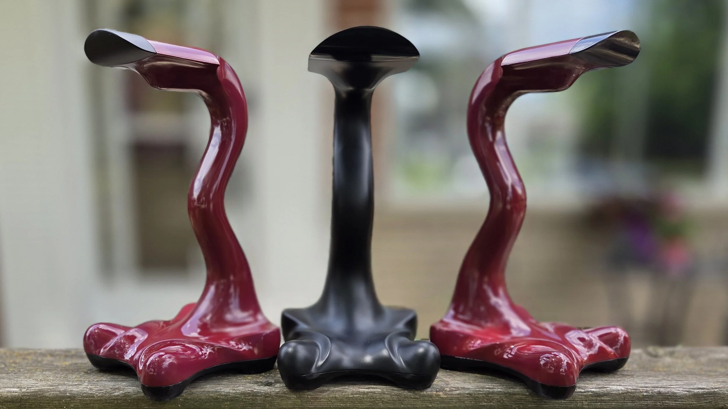 Quacknacridone-Red-Grumpy-Goose-Headphone-Stands-OUtside.jpg