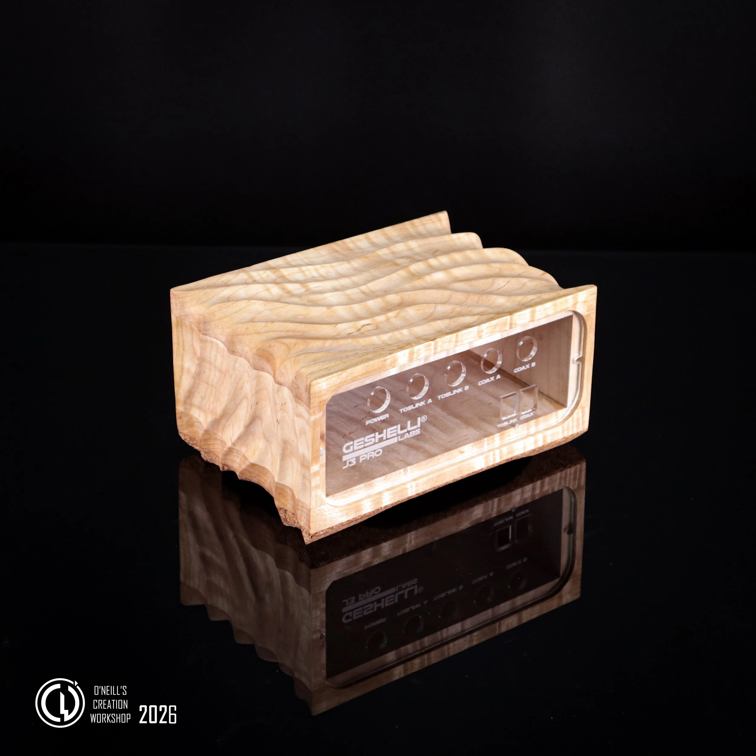 Curly-Maple-Geshelli-labs-custom-carved-case-2026 (3).jpg
