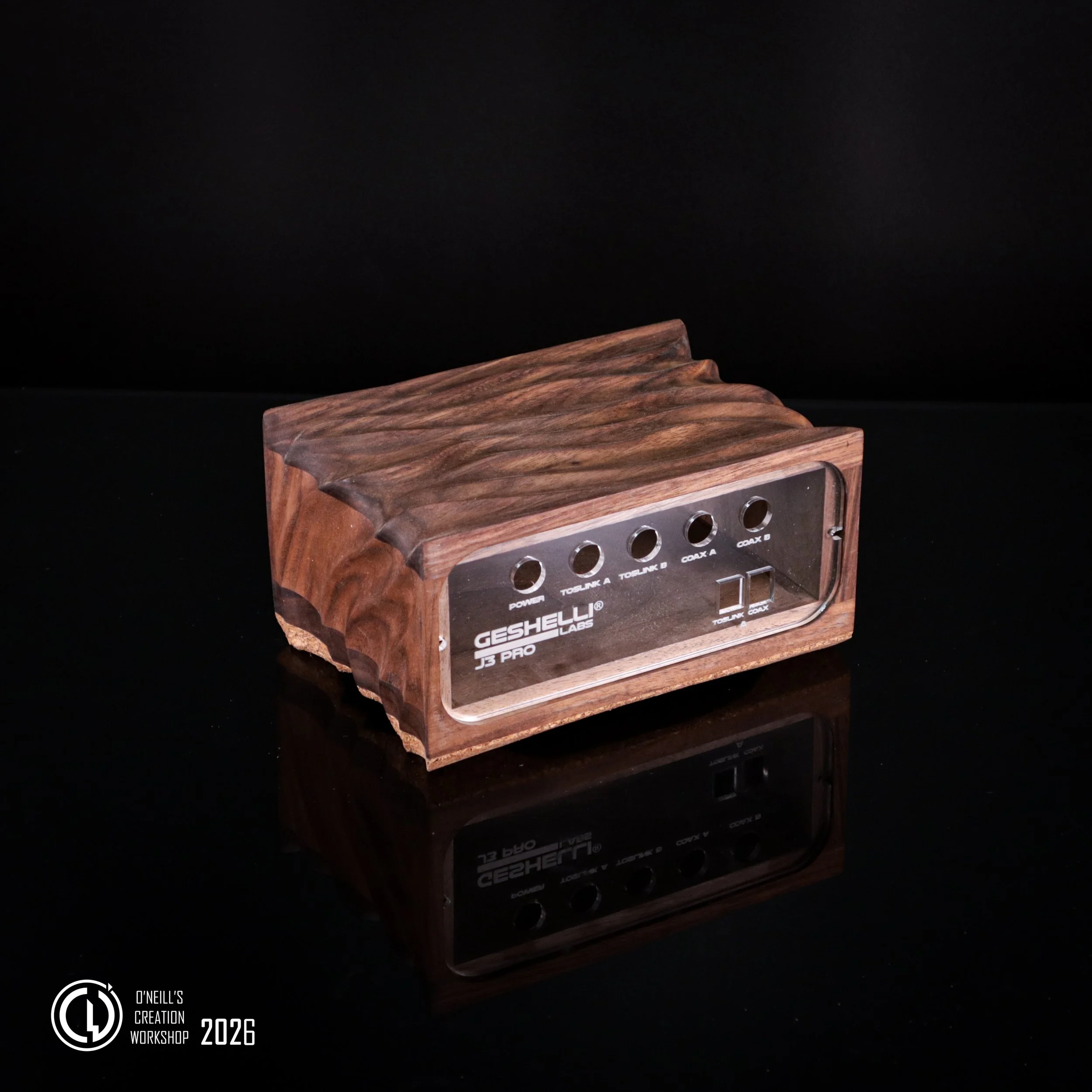 Black-Walnut-Geshelli-labs-custom-carved-case-2026 (2).jpg