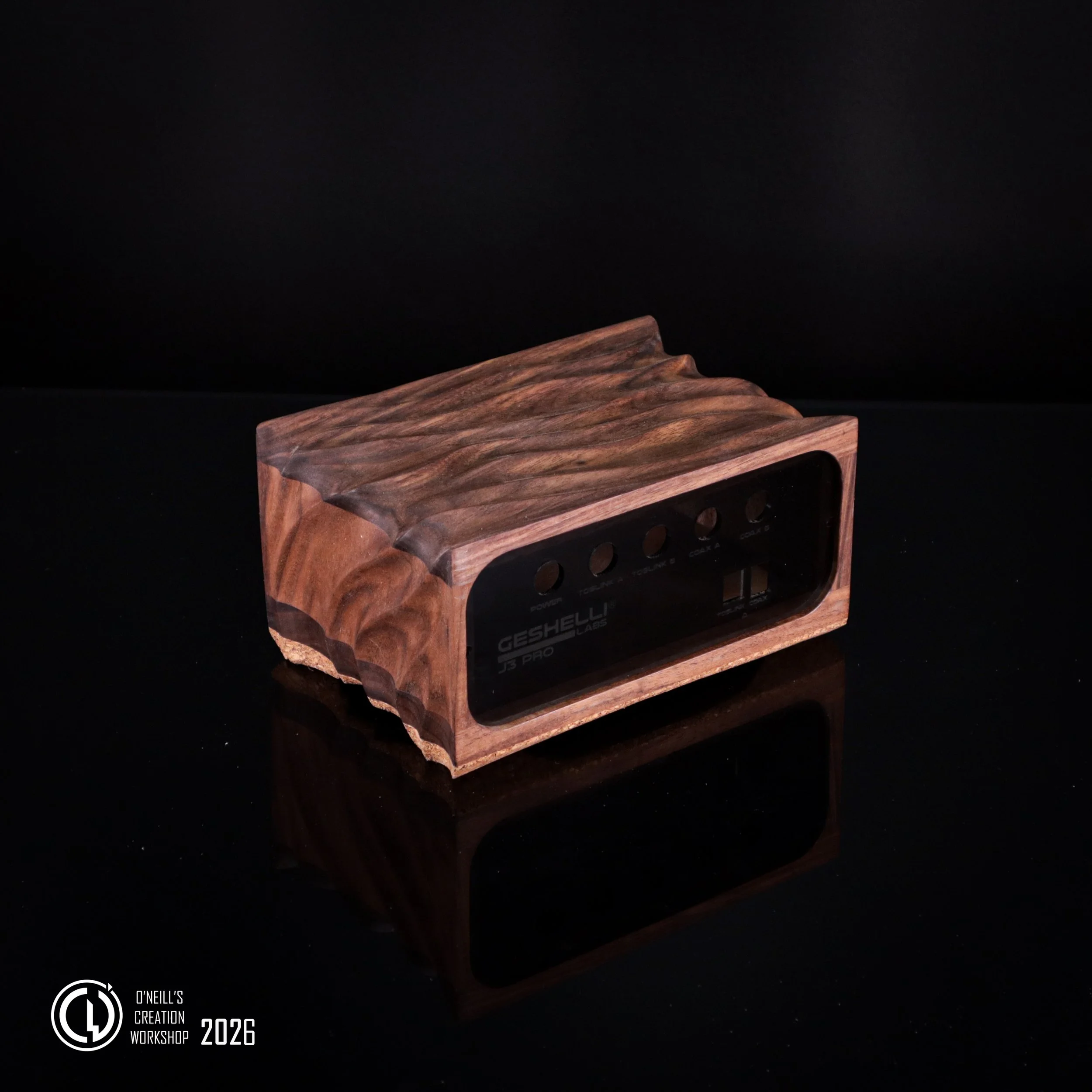 Black-Walnut-Geshelli-labs-custom-carved-case-2026 (1).jpg