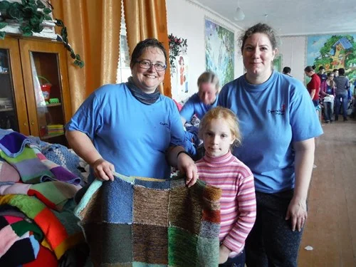 Blanket made by Ollaberry School pupils finds a new owner.