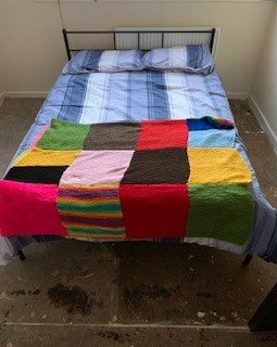 Rainbow blanket bed.jpg
