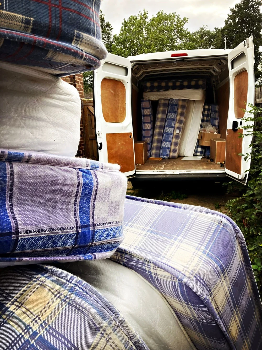 loading van with mattresses.jpg