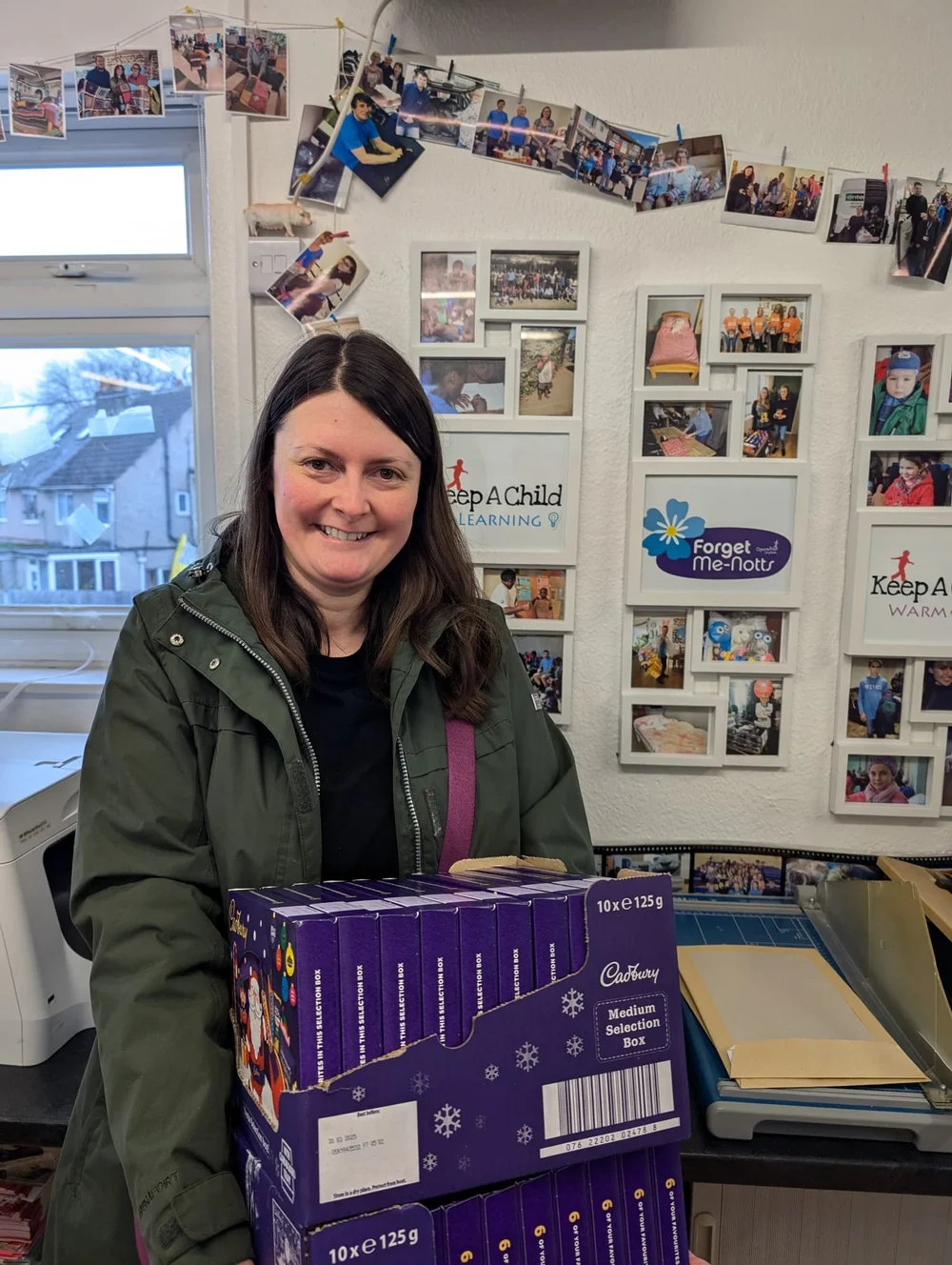 Heather Beardsley (local) with boxes.jpeg