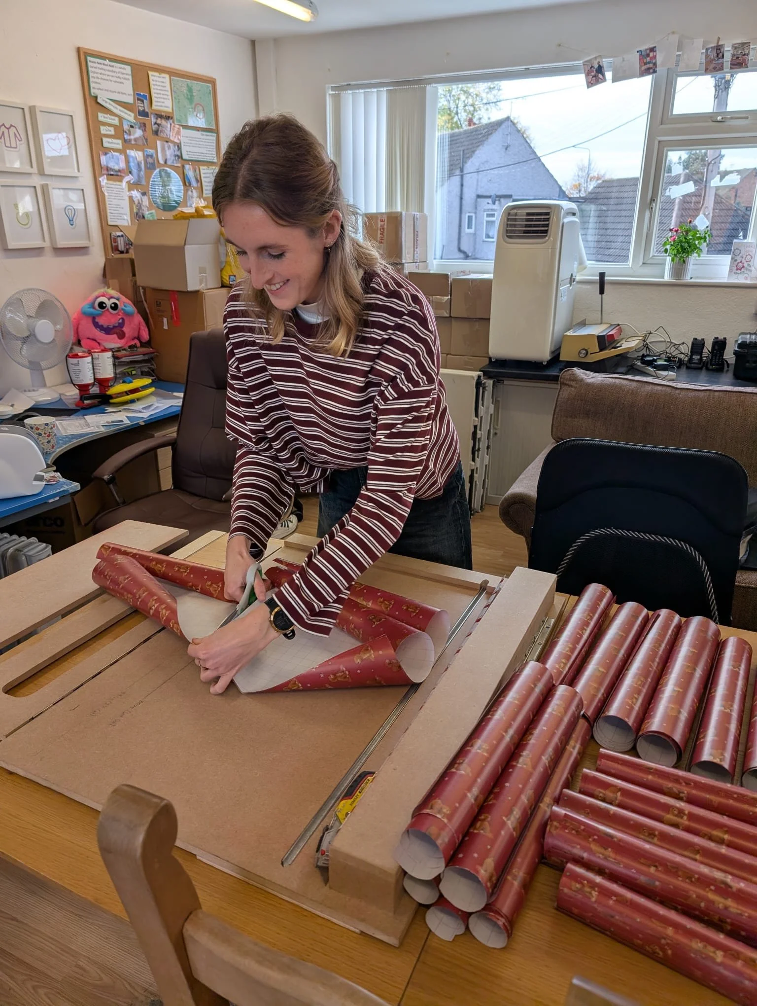 Rebecca cutting paper.jpeg