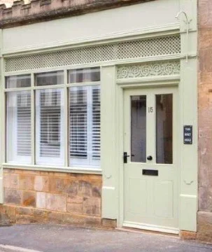 The exterior view of The Bolt Hole, a residential home that was previously a butcher shop and a florist