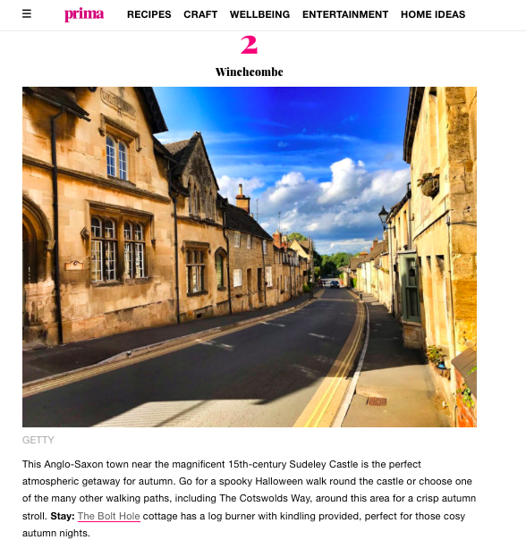 A screenshot of a Prima Magazine article titled "5 of the bes places in the Cotswolds for an autumn staycation," featuring a highlighted recommendation for weekend escapes from Unique Cotswold Cottages
