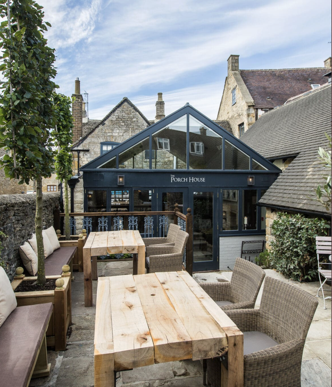 The outdoor seating area at The Porch House in Stow-on-the-Wold, an inn known for being dog-friendly and historic