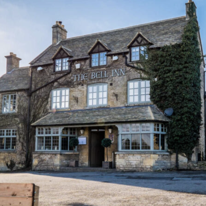 The exterior of The Bell Inn in Stow-on-the-Wold, a welcoming and dog-friendly pub located near countryside walking paths