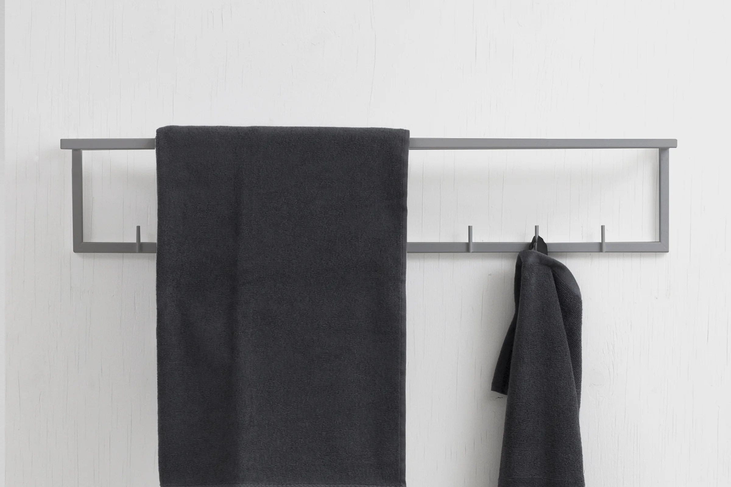 mllmtr_shop image 06_L1-bthr 900 GREY_wall mounted towel rack_front view_grey towels.jpg