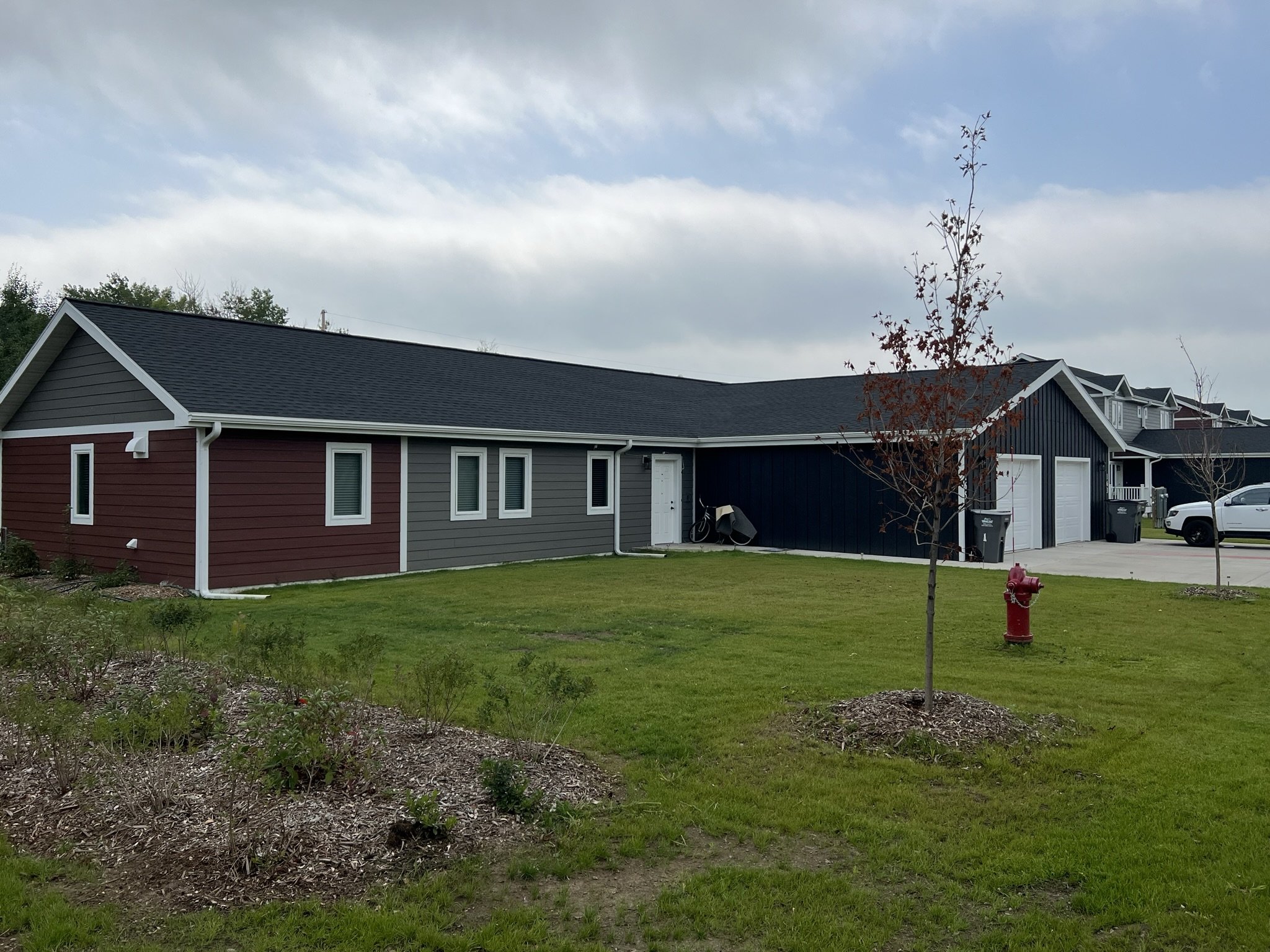 Exterior view of modular duplex at Red Willow Estates, designed by Artekta Architects