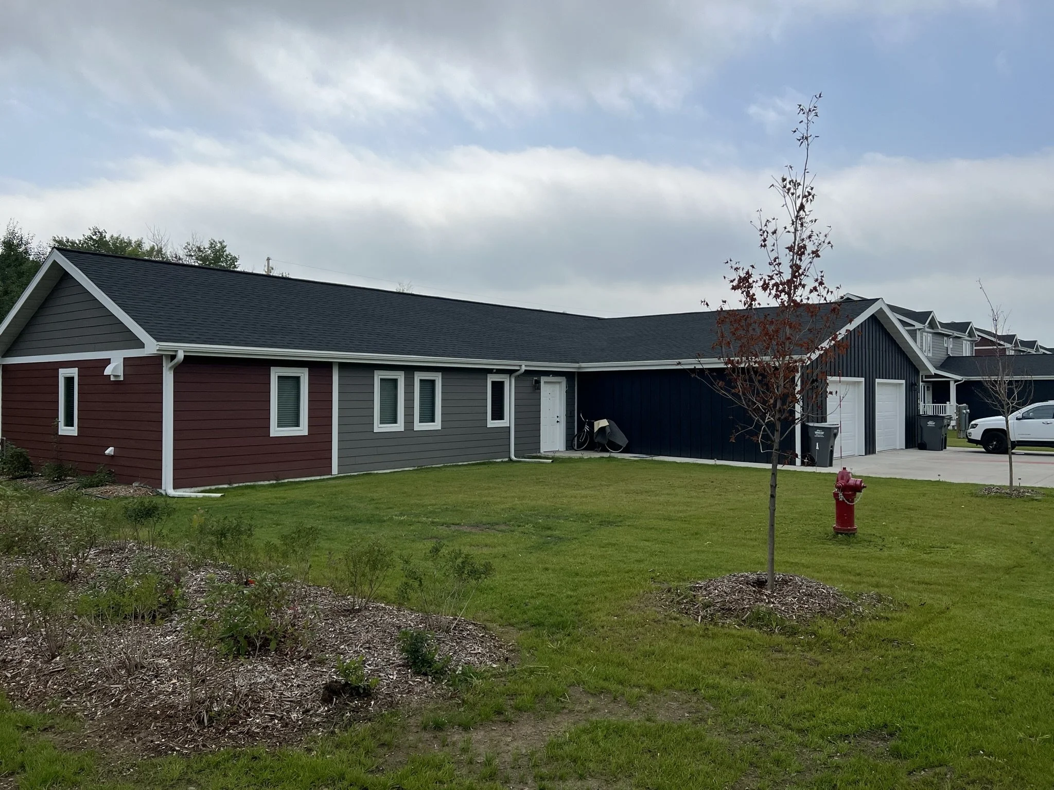 Exterior view of modular duplex at Red Willow Estates, designed by Artekta Architects