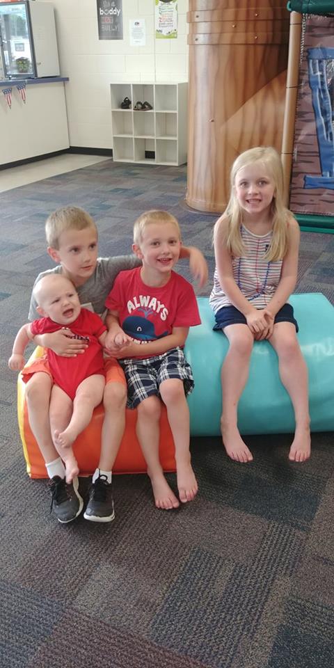 4 children smiling