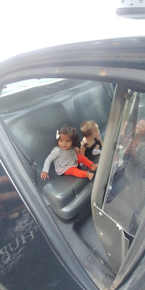Kids in police car