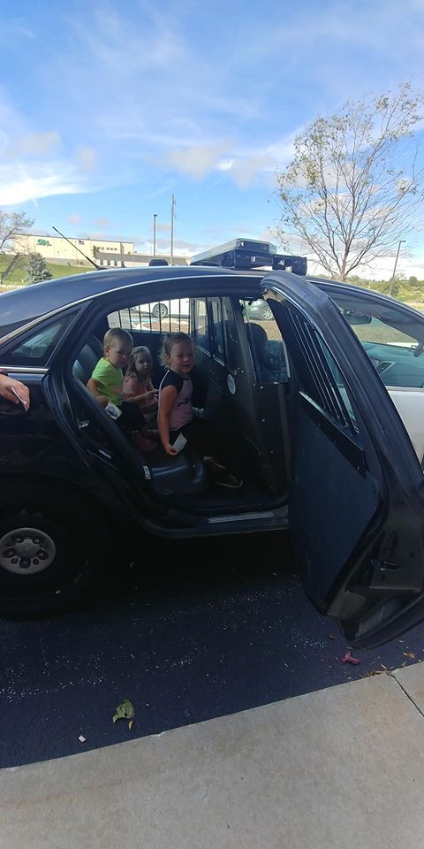 Children in police car