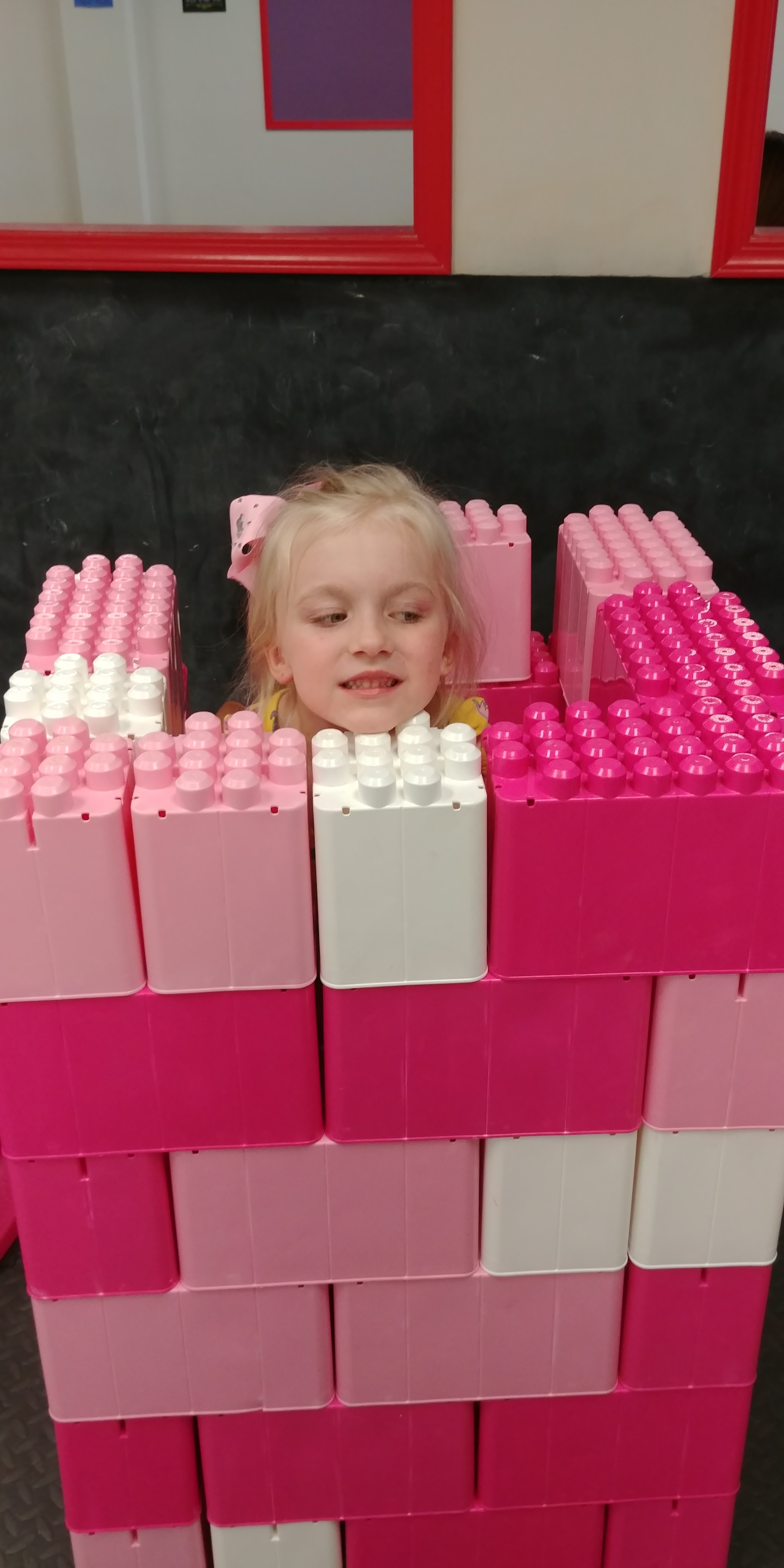 Girl in block tower