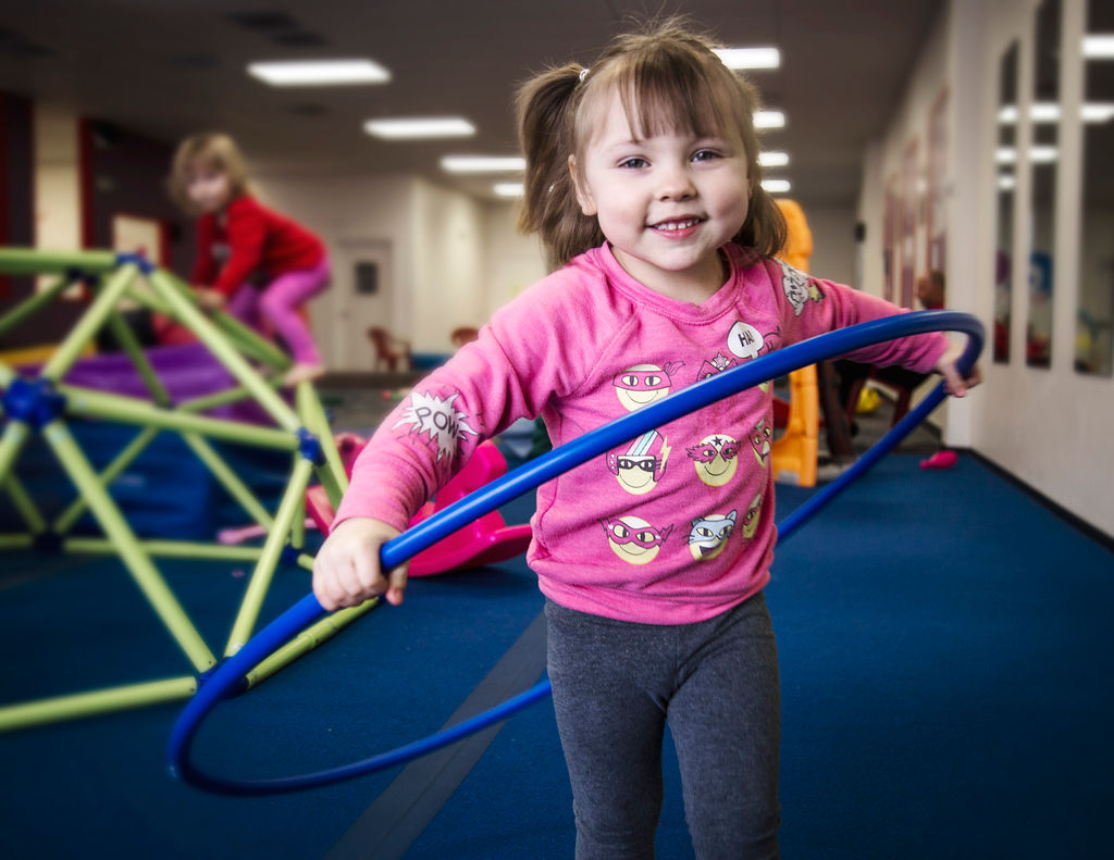 Girl with hula hoop