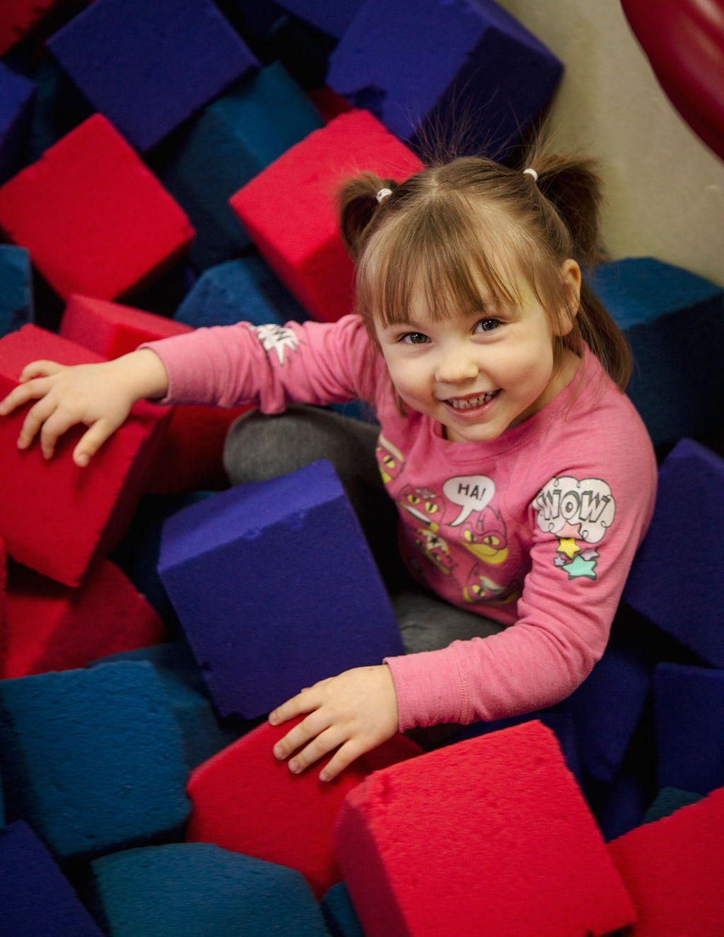 Girl in foam pit