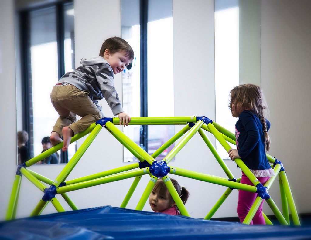 Children on spider web