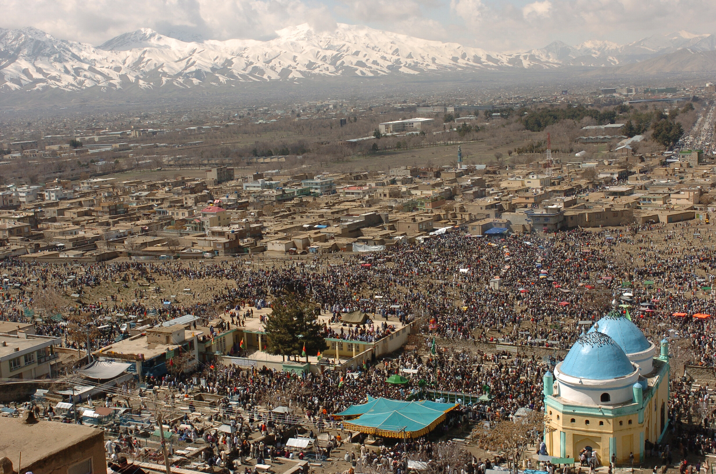  Afghan people gather at a shrine in Kabul, 21 March 2007, as part of hold the celebrations surrounding Naw Rooz, (Afghan and Persian New Year). Naw Rooz is is one of the oldest holidays celebrated in Central Asia, and is marked by feating and the an