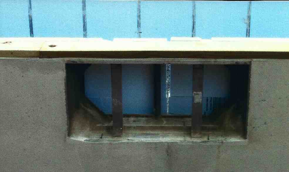 window frame out concrete foundation.jpg