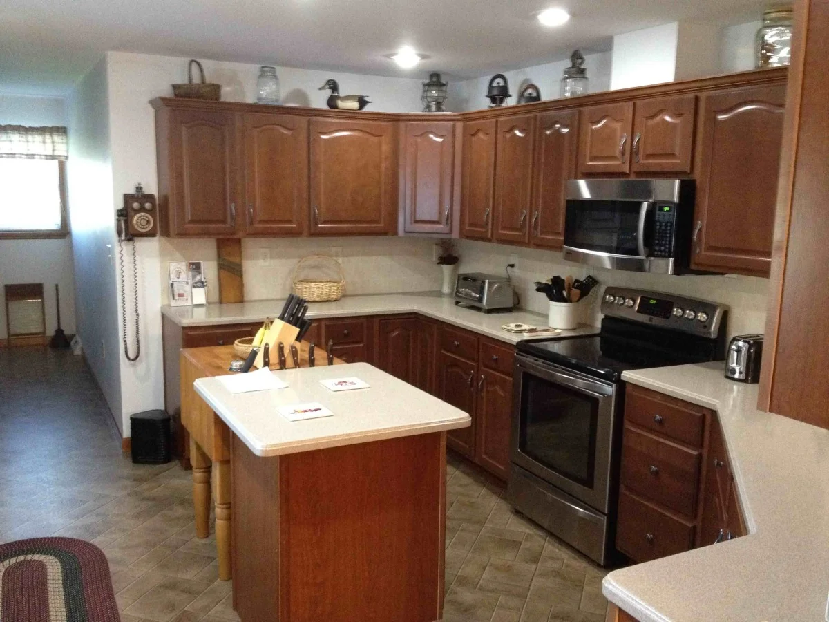 Cinnamon Maple Cabinets with Corian Countertops