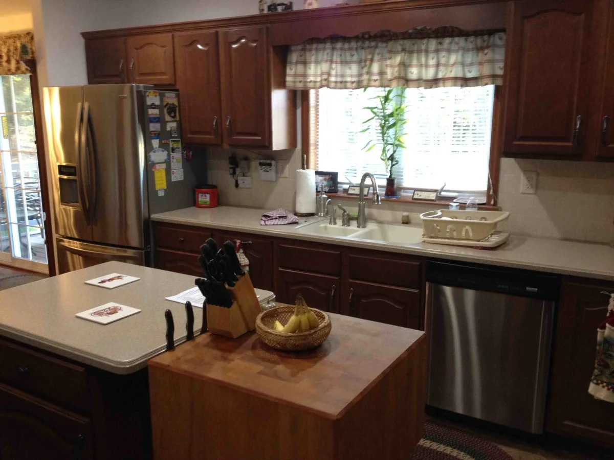 Corian Countertops and Sink with Butcher Block Island