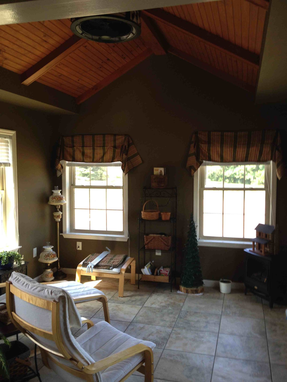 Cozy All Season Room with Stained Pine Ceiling and Ceramic Tile Floor