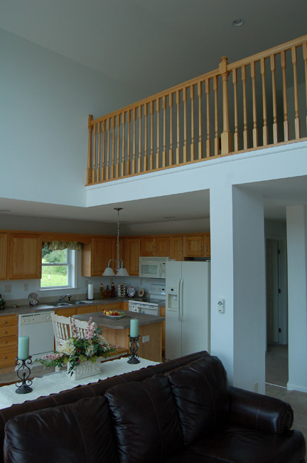 View of Loft and Kitchen from Living Room