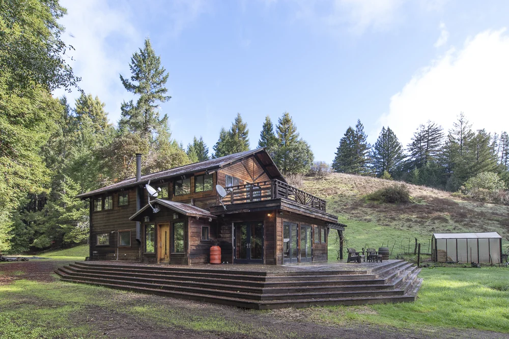 Beautiful view of 2 story, 3 bed, 2 bath home on 21 acres.