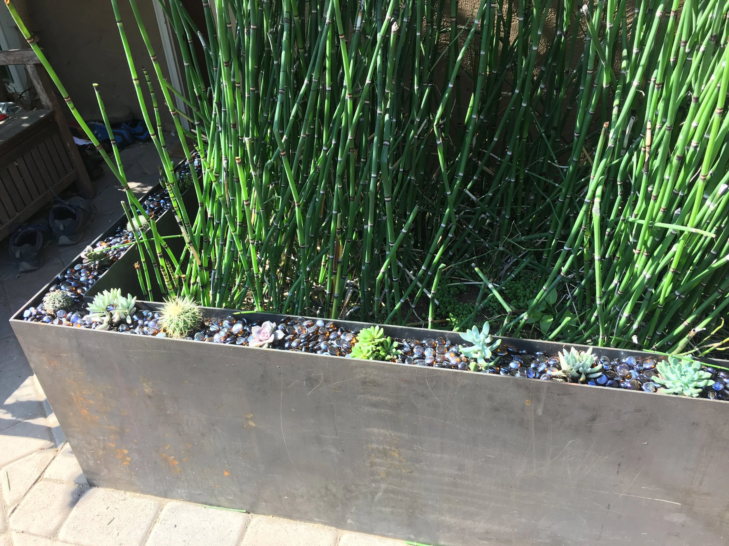 Corten Steel Planter Box This planter features a double-walled design and LED lighting accents.