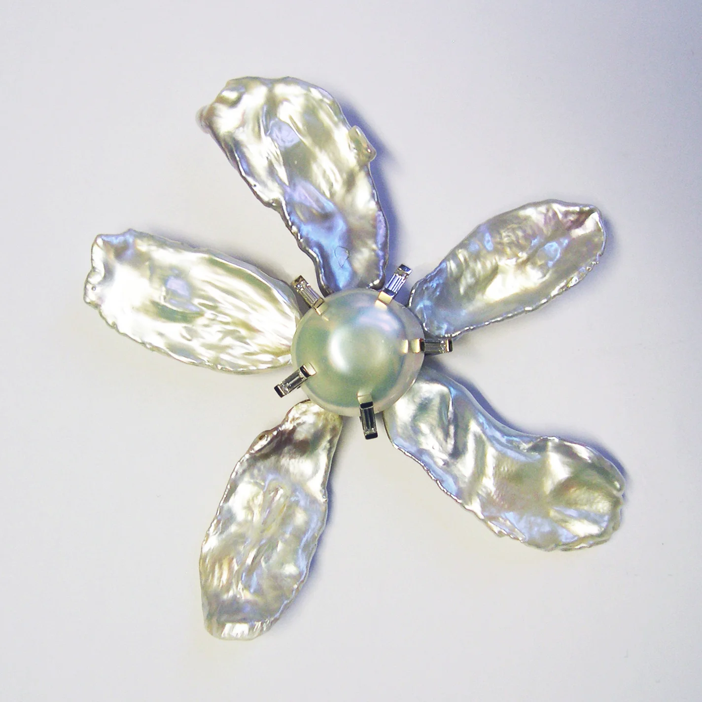 FP-4094 Freswater Button and Baroque Pearls set with Diamond baguettes in 18K white Gold. Price upon request.jpg