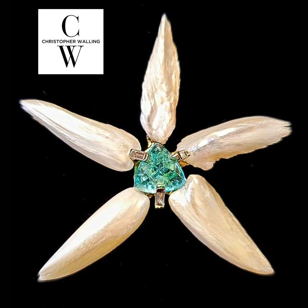 Diamonds connect one of the rarest of gems (the recently discovered true Paraiba Tourmalines from Brazil) to among the rarest of Pearls (Natural American Mississippi River Pearls) - and turn them all into a timeless flower brooch❗️

Try it on - by ap