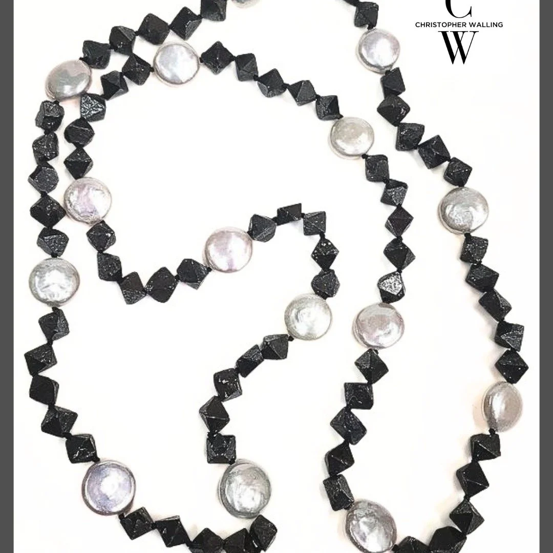 Magnetite cubes (which tend to look like Black Diamonds!) connect fine "Coin" Pearls in a most affordable 24" "Chain" which one can combine with several other chains (of pearls? Of gold?) - or wear alone! 

By Appt. - Park Av